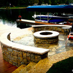 hardscape, lakeside, seatwall, stone wall, dock incorporated design, gathering space