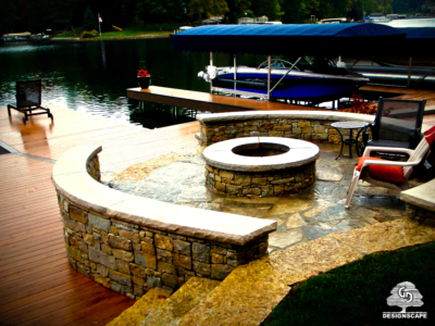 hardscape, lakeside, seatwall, stone wall, dock incorporated design, gathering space