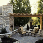 hardscape, outdoor living area, stone fireplace, residential, pergola, pavers